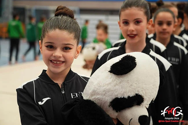 Sonrisas del equipo durante el desfile